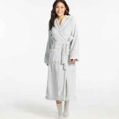 A fluffy white terry cloth robe for her